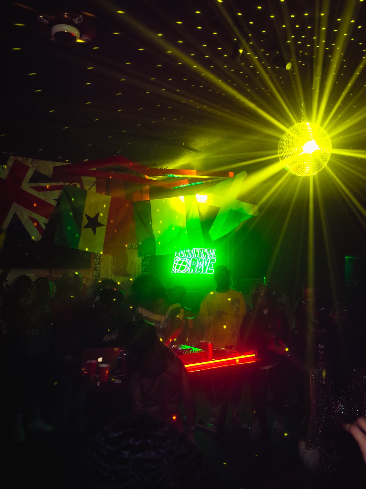 Disco ball throwing light over the dance floor